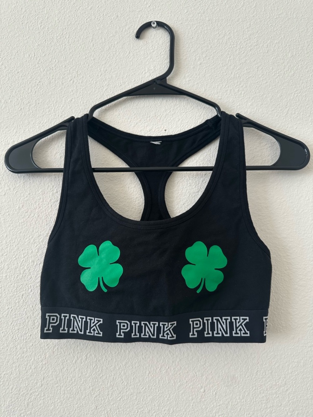 PINK Victoria's Secret Black Racerback Sports Bra with Green Shamrock Motifs